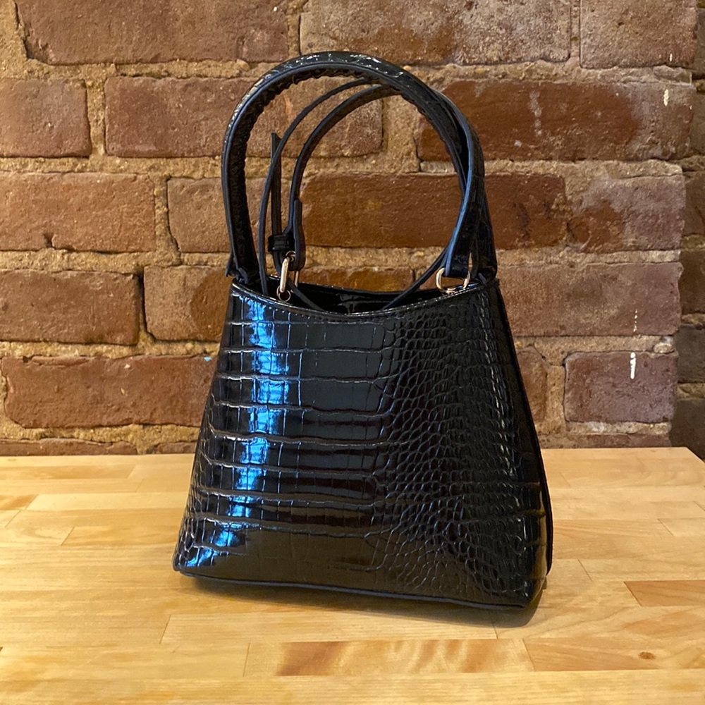 Black alligator skin handbag